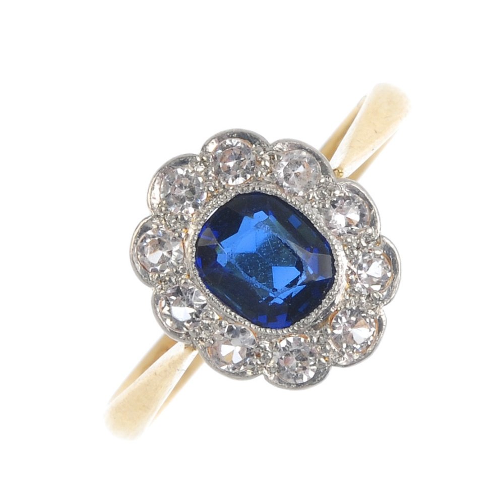 A mid 20th century 18ct gold paste cluster ring. The (1 of 3)