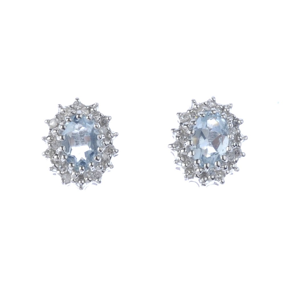 A pair of aquamarine and diamond cluster earrings. Each (1 of 2)