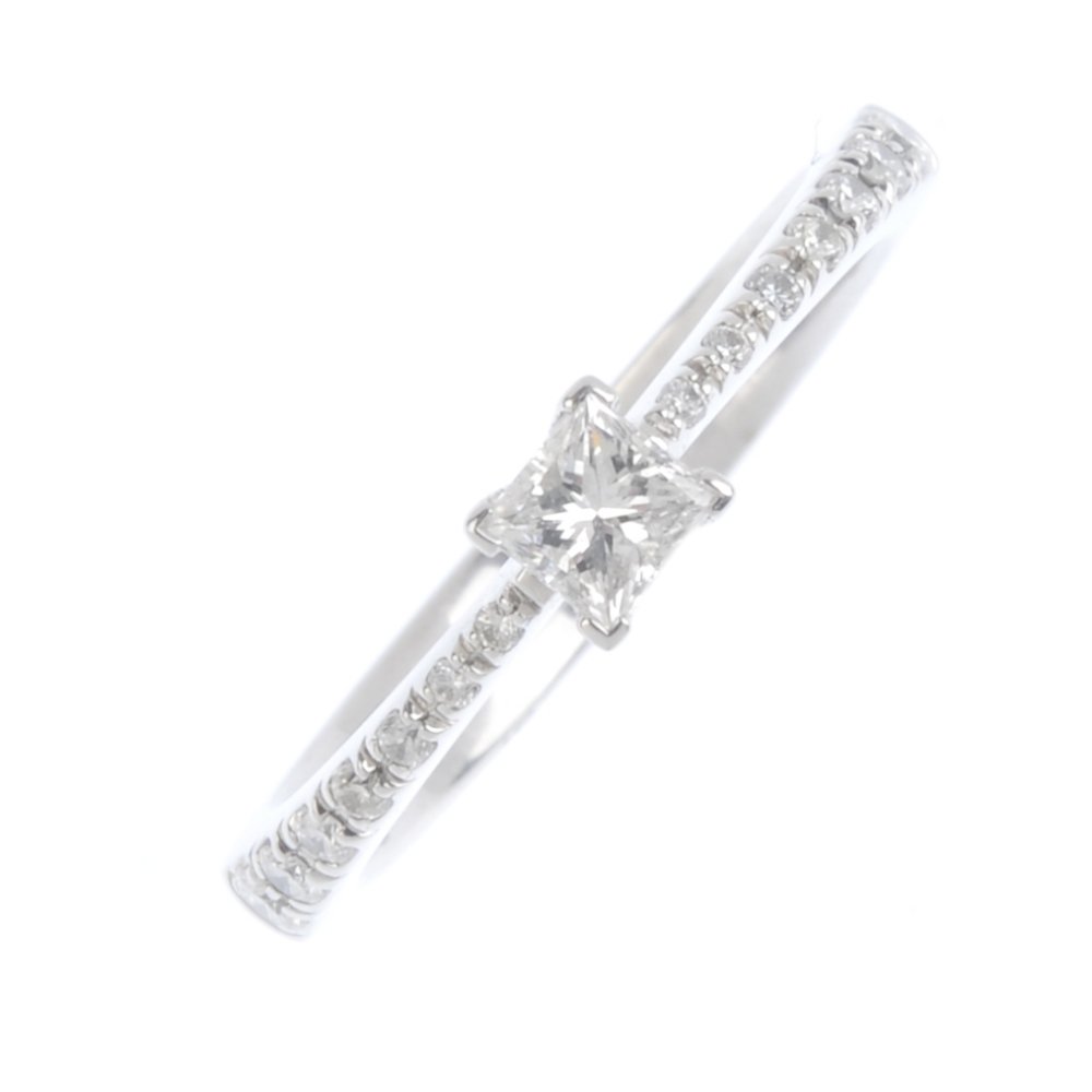 An 18ct gold diamond single-stone ring. The (1 of 2)