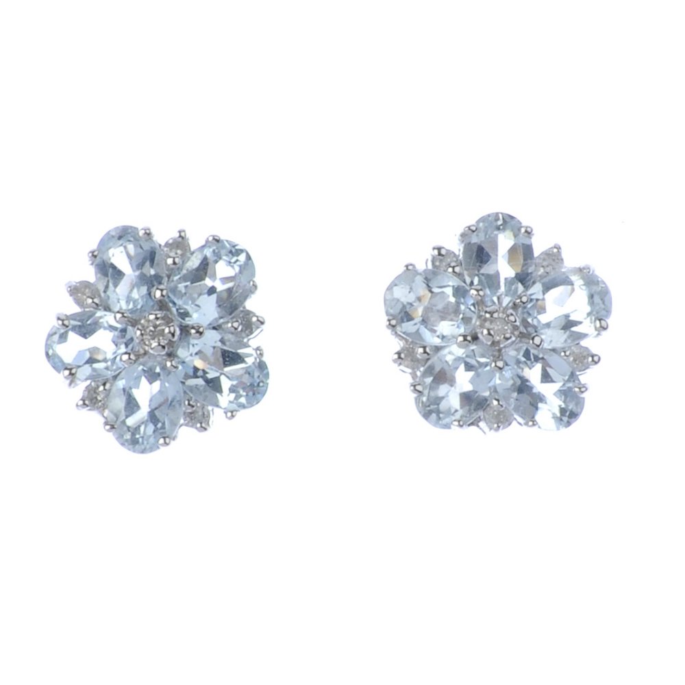 A pair of 9ct gold aquamarine and diamond earrings. (1 of 2)