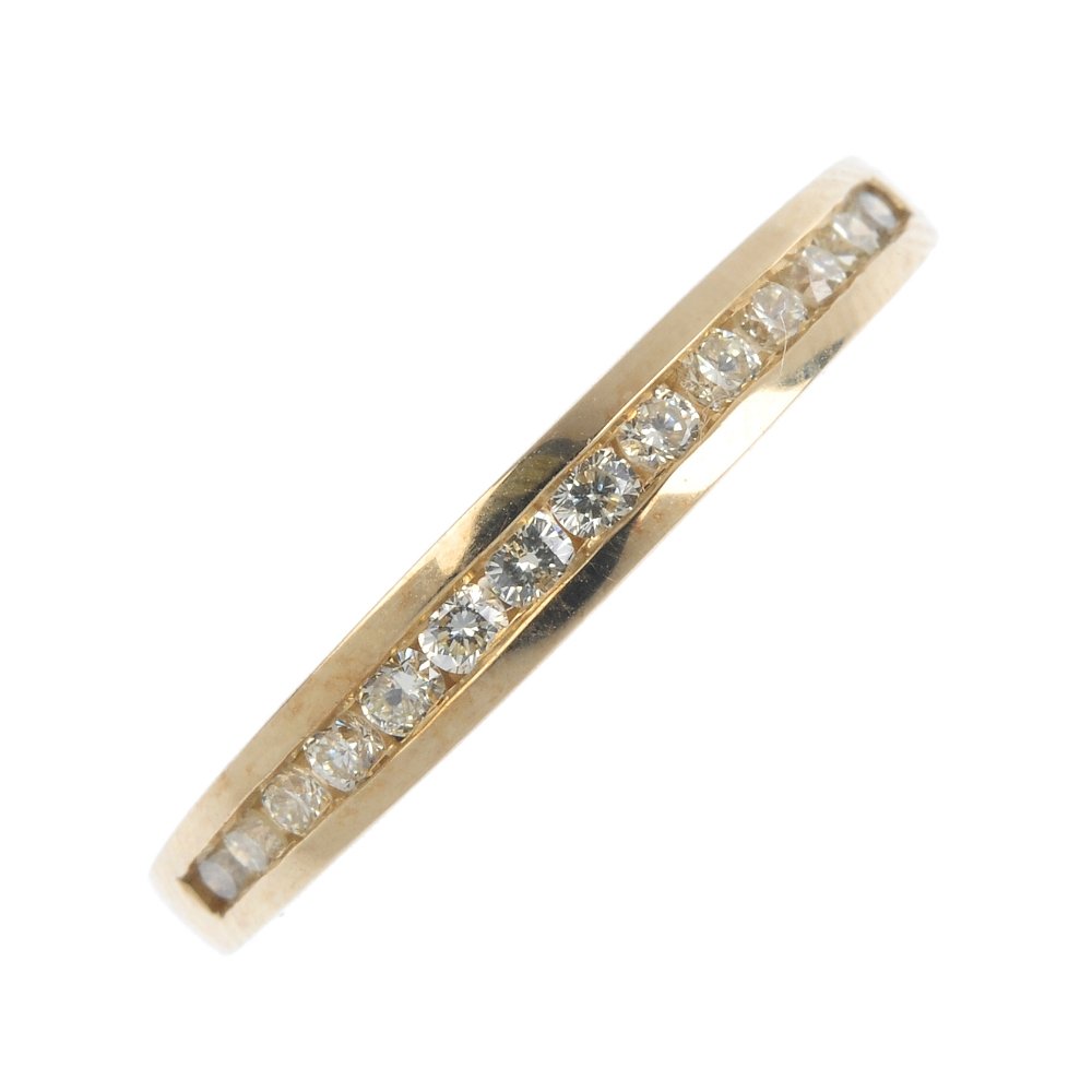 A 14ct gold diamond half-circle eternity ring. The (1 of 3)