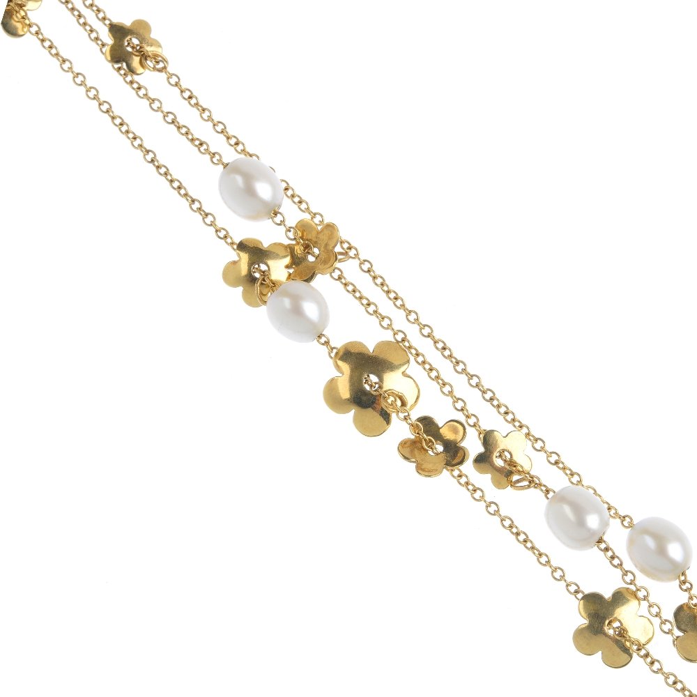 An 18ct gold and cultured pearl bracelet. Designed as (1 of 2)