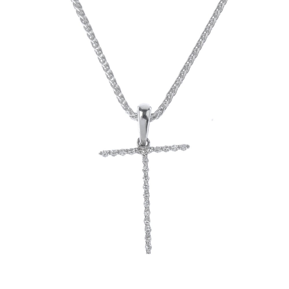 An 18ct gold diamond initial 'T' pendant. The (1 of 2)