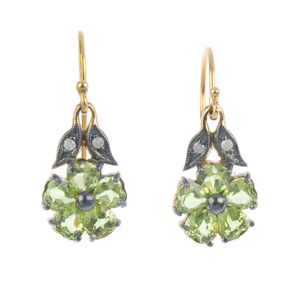 A pair of peridot and diamond earrings. Each designed (1 of 1)