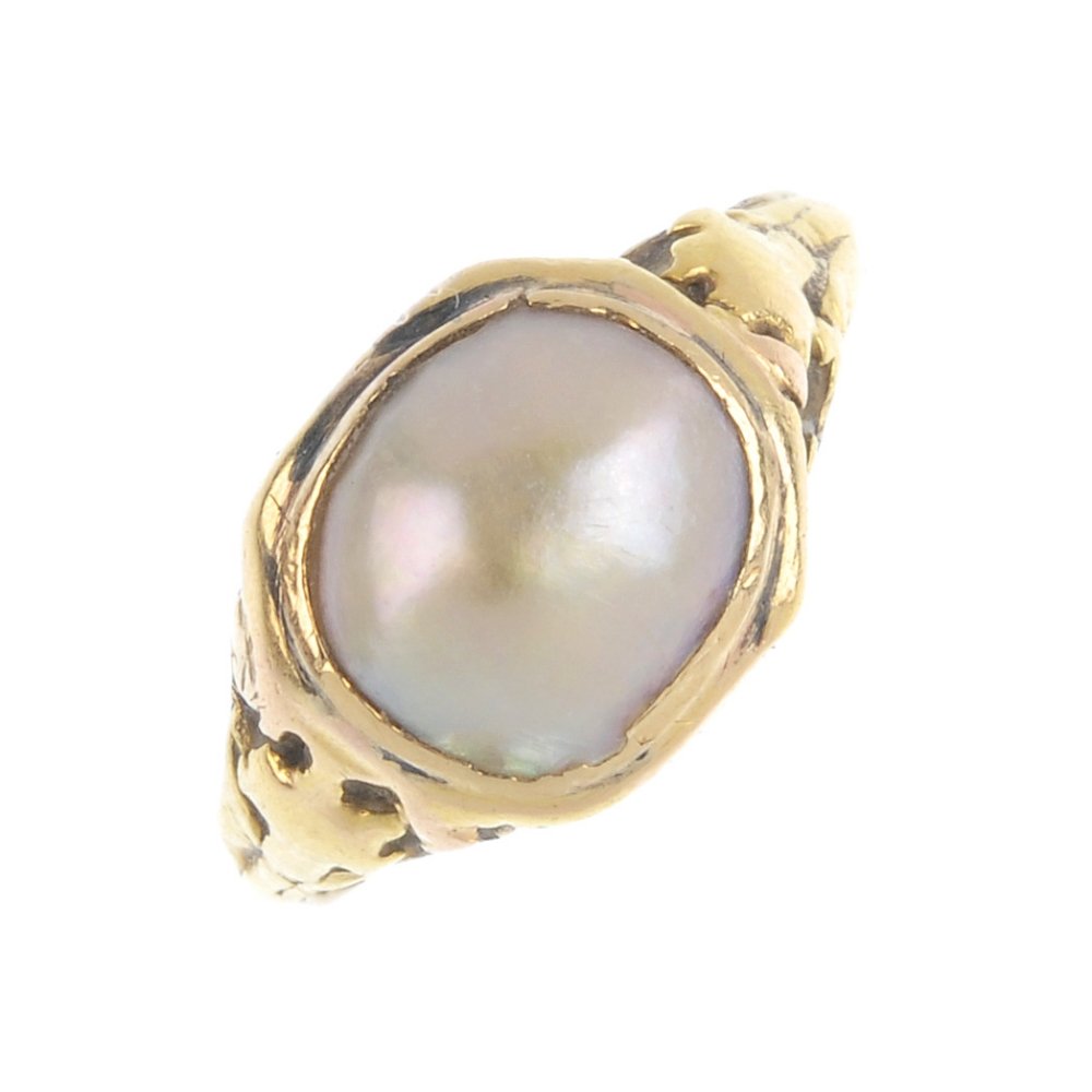 A mid Victorian split pearl ring. The split pearl (1 of 3)
