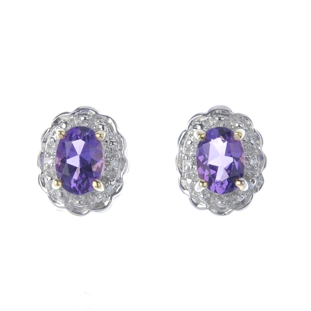 A pair of 9ct gold amethyst and diamond cluster (1 of 2)