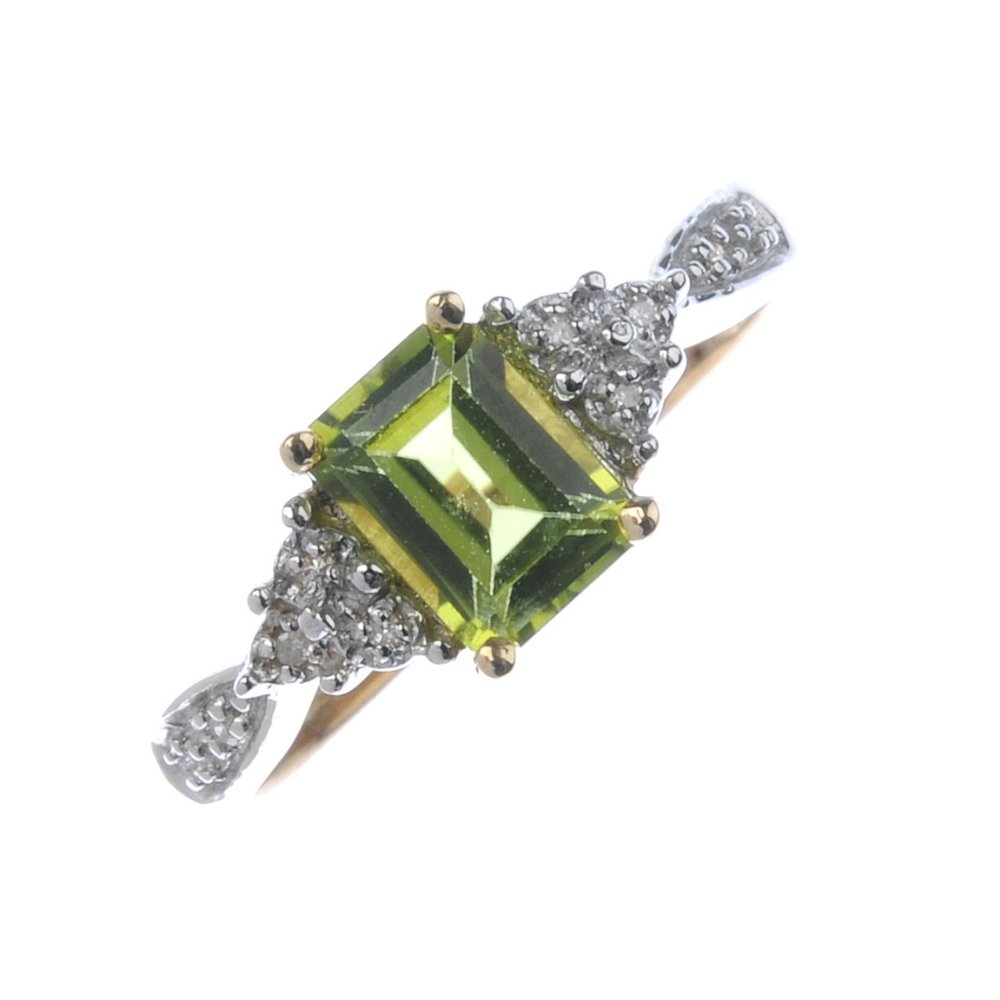 A 9ct gold peridot and diamond ring. The (1 of 4)