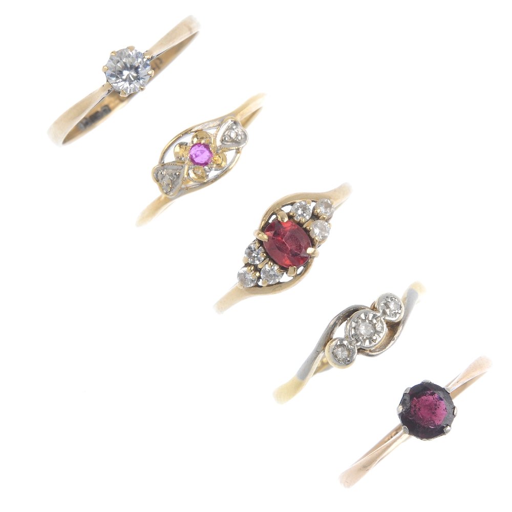 Five gold gem-set rings. To include an early 20th (1 of 4)