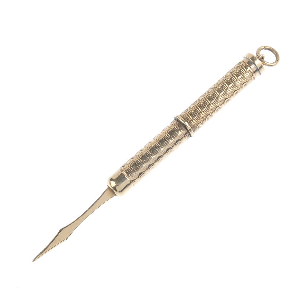 A 1970's 9ct gold toothpick. With engraved body detail. (1 of 2)