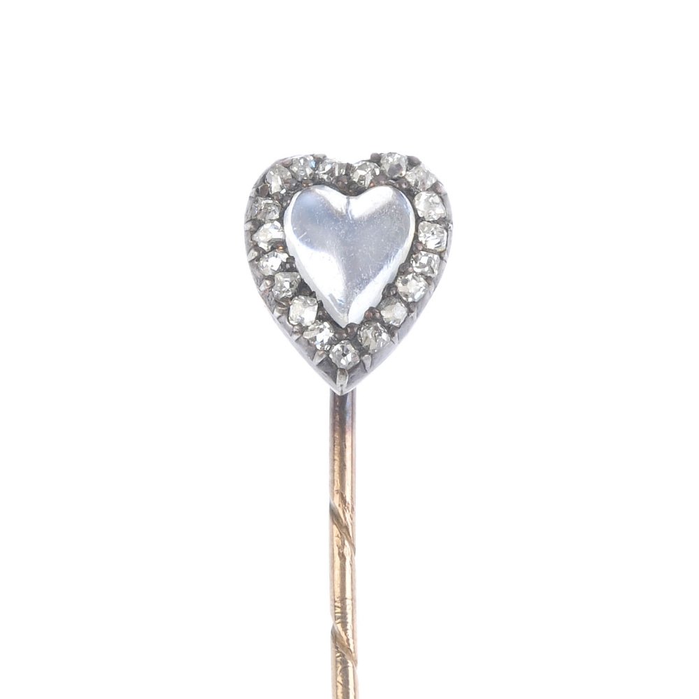 A late Victorian moonstone and diamond stickpin. The (1 of 3)