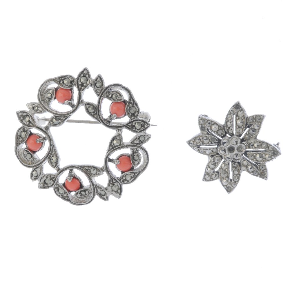 A selection of marcasite jewellery. To include a brooch: A selection of marcasite jewellery. To include a brooch in the shape of a feather, set with marcasite and a dress watch with a marquise shape head and floral links. (16) Lengths 2.4 to 17.5cms. Weight