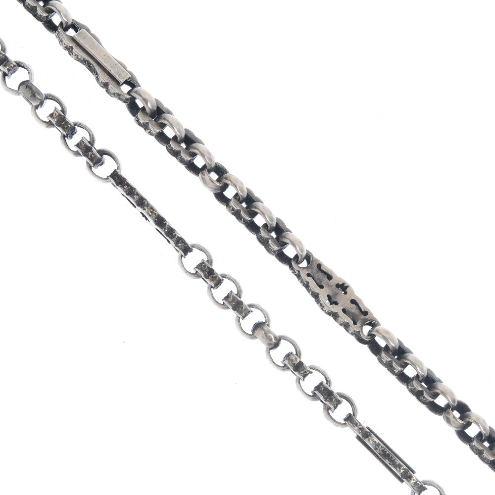 Four chains. To include a fancy-link Albertina chain,: Four chains. To include a fancy-link Albertina chain, with engraved alternate links and a lobster-claw clasp, together with two graduated curb-link bracelets with lobster-claw clasps and another curb-