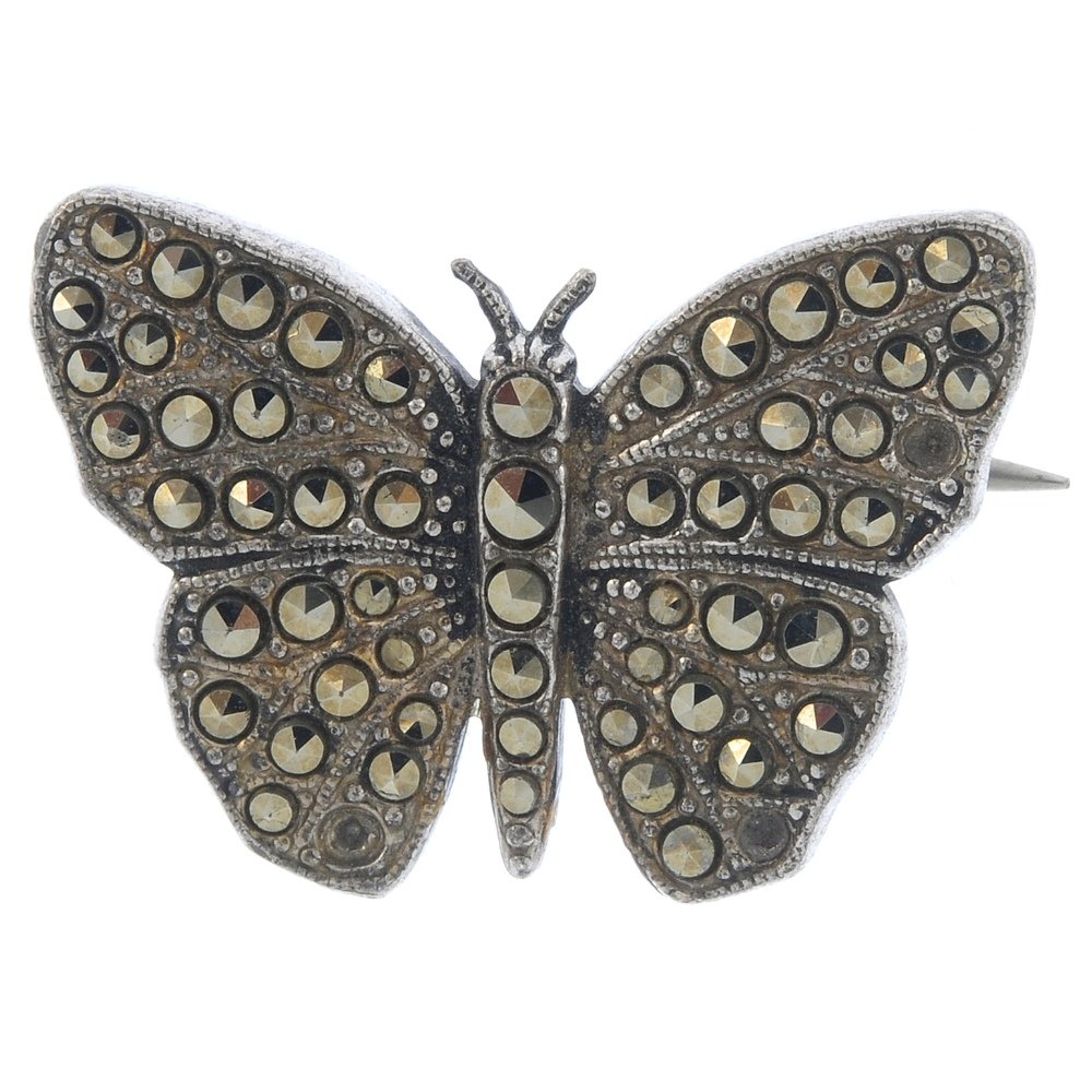 A selection of jewellery. To include an SOS talisman: A selection of jewellery. To include an SOS talisman locket, a marcasite butterfly brooch, with further jewellery. (23). Due to the amount of items in this lot we are unable to give a detailed conditi