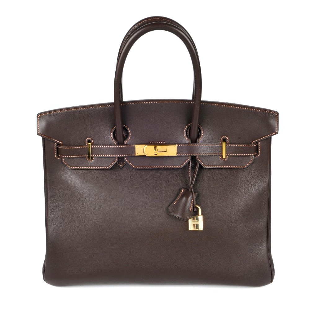 HERMES - a brown Swift Birkin 35 handbag. Featuring a (1 of 6)