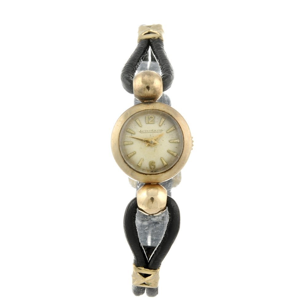 JAEGER-LECOULTRE - a lady's wrist watch. 9ct yellow: JAEGER-LECOULTRE - a lady's wrist watch. 9ct yellow gold case, hallmarked London 1959. Numbered 4341. Signed manual wind movement. Silvered dial with baton hour markers, Arabic numeral twelve and six.