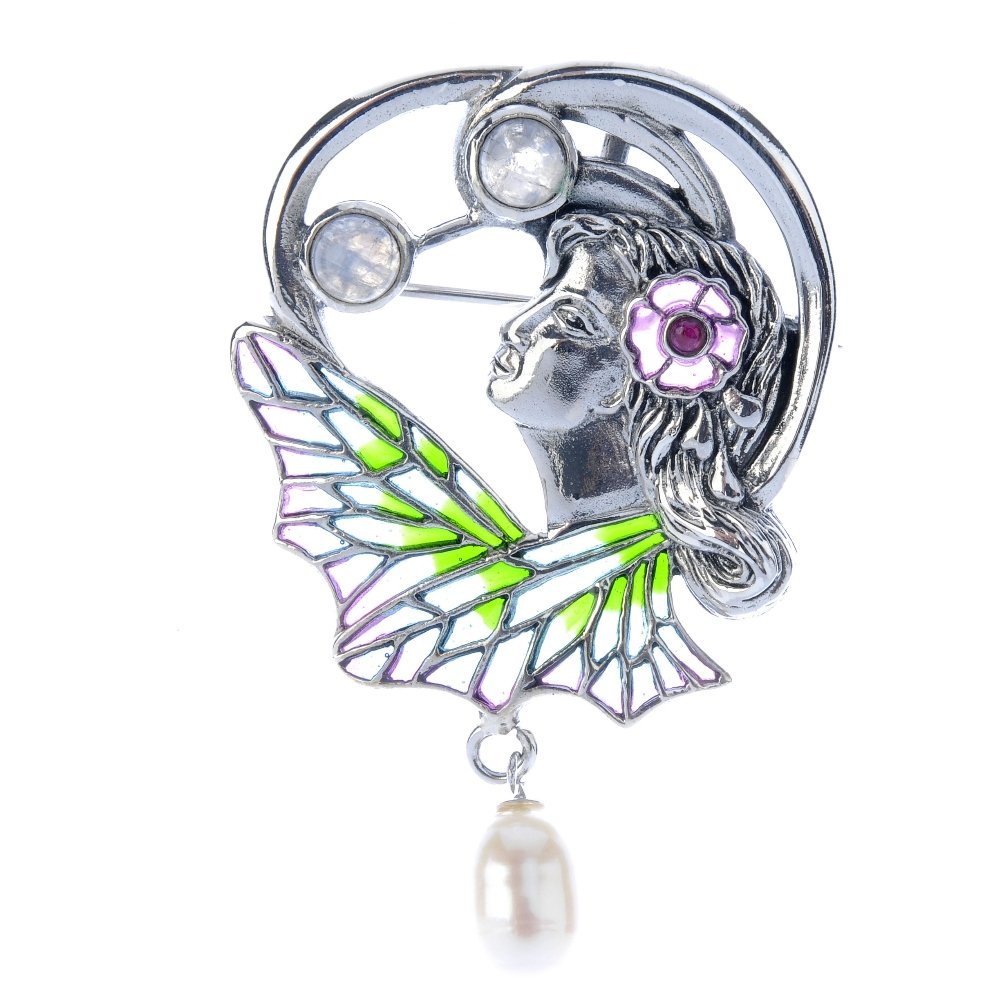 A plique-a-jour enamel and gem-set brooch. Depicting a: A plique-a-jour enamel and gem-set brooch. Depicting a lady in profile, with plique-a-jour enamel and red gem floral highlight, to the plique-a-jour enamel butterfly wing and labradorite cabochon scro