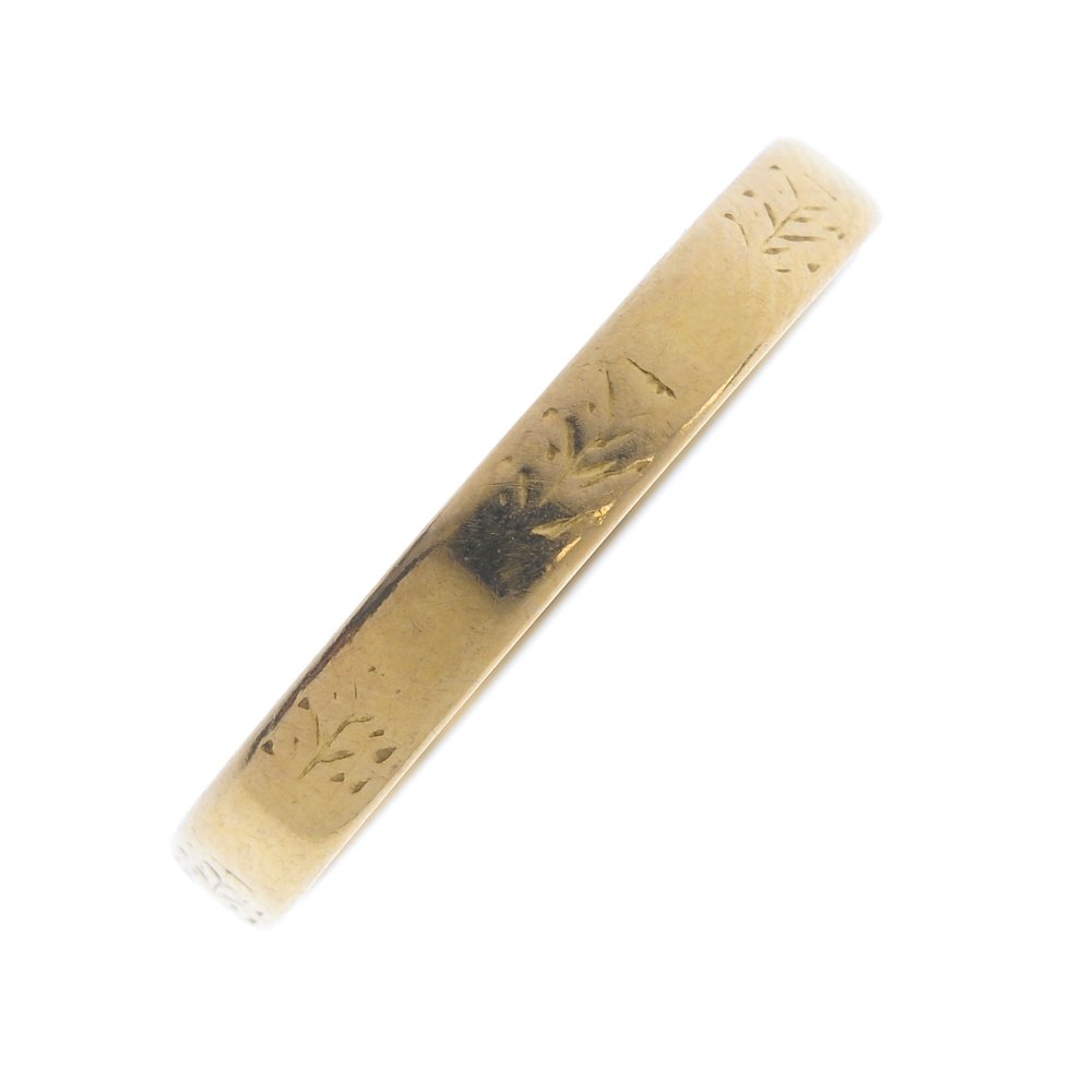 A 1950s 22ct gold band ring. Hallmarks for Birmingham, (1 of 3)