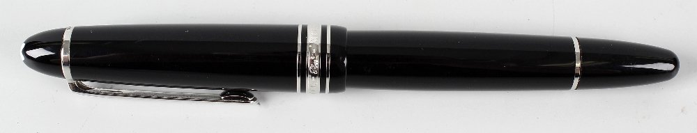 A Montblanc Meisterstuck Pix fountain pen, having black: A Montblanc Meisterstuck Pix fountain pen, having black resin body, silver coloured banding and Montblanc emblem terminal, 5.75 (14.5cm) long. Surface scratching.Please note that this lot is untested 