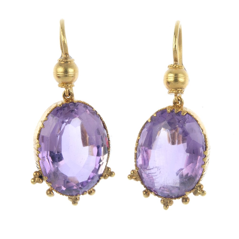A pair of amethyst earrings. Each designed as an (1 of 2)