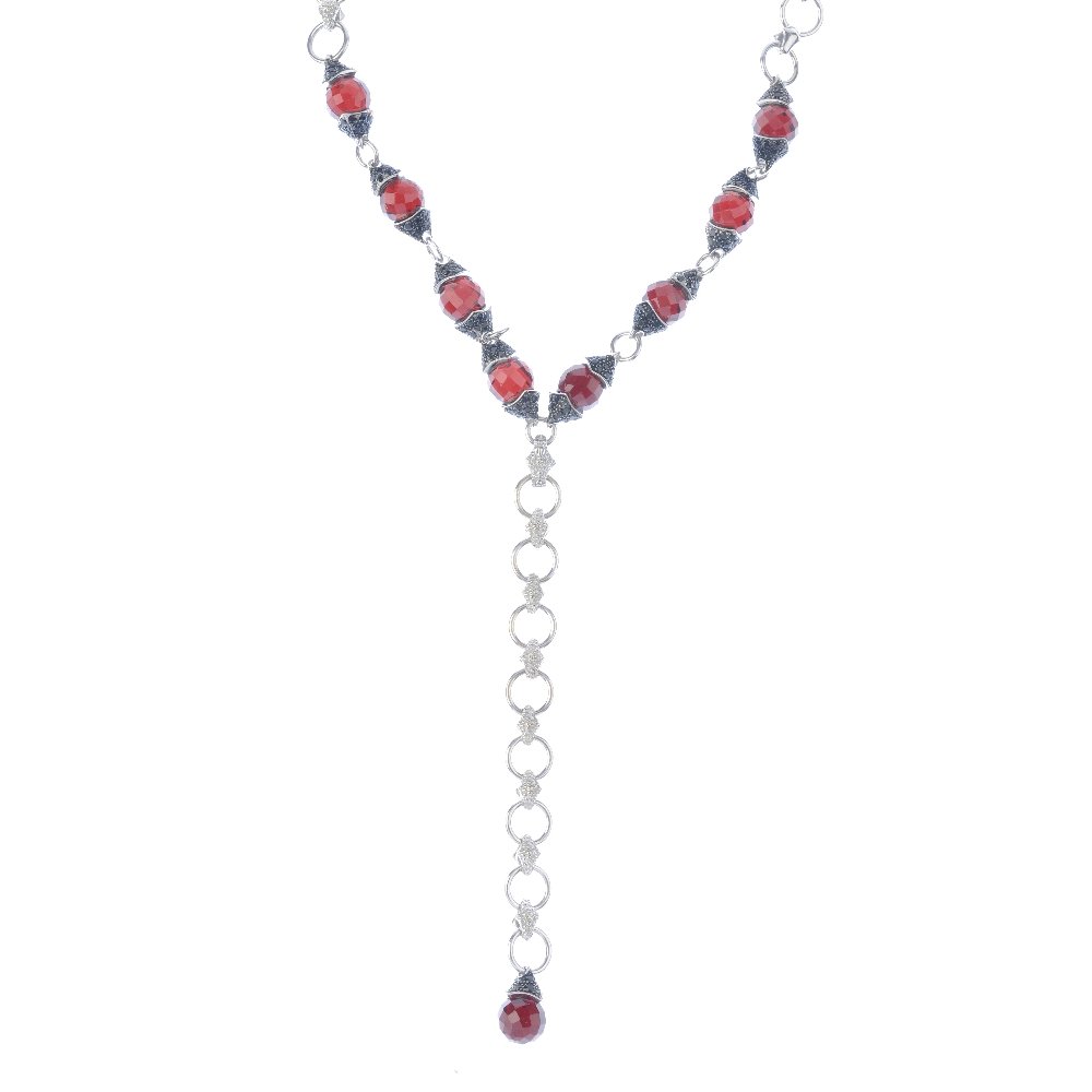 STEPHEN WEBSTER - an 18ct gold gem-set necklace.: STEPHEN WEBSTER - an 18ct gold gem-set necklace. Designed as a faceted garnet bead and blue gem cap drop, suspended from an alternating hoop and textured link spacer, to the similarly-designed faceted