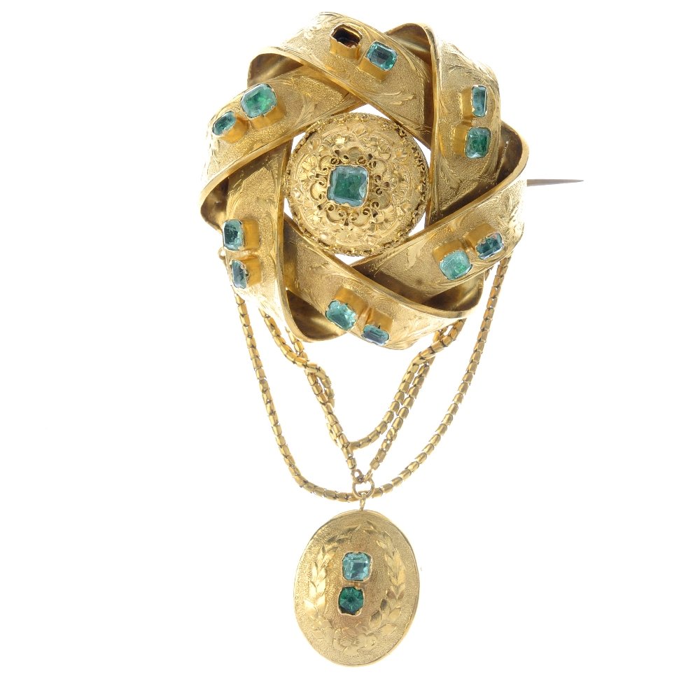 A late Victorian gold emerald brooch. The square-shape (1 of 2)