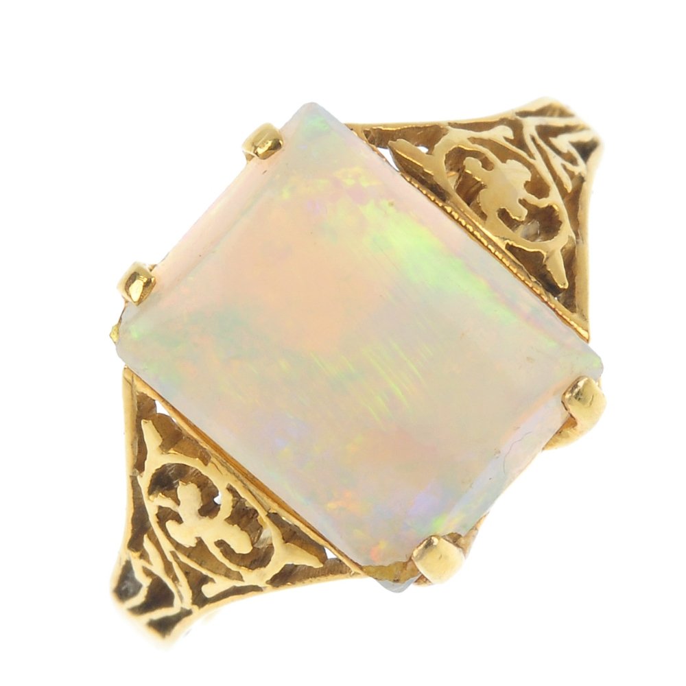 An opal single-stone ring, AF. The rectangular opal (1 of 2)