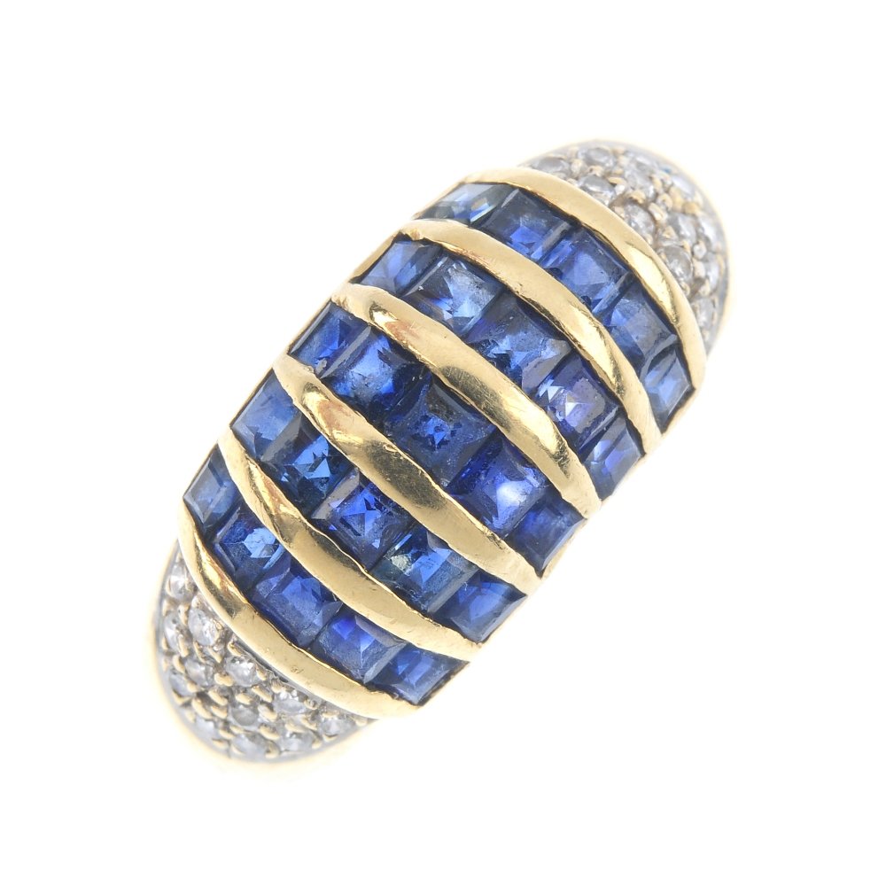 A 14ct gold sapphire and diamond dress ring. Comprising (1 of 3)