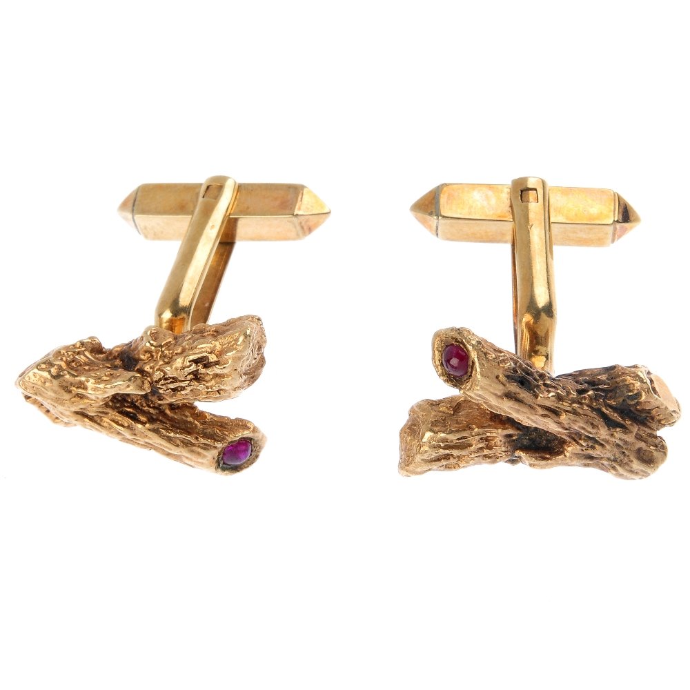 A pair of 1960s 9ct gold ruby cufflinks. Each designed (1 of 2)