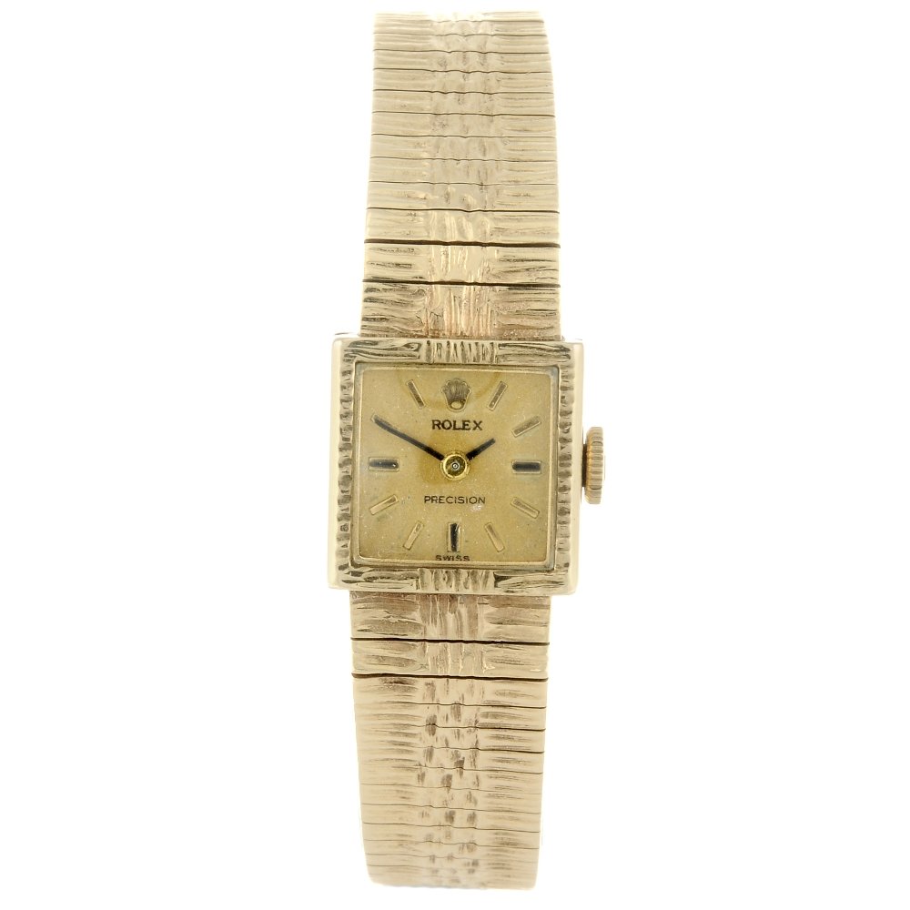 ROLEX - a lady's bracelet watch. 9ct yellow gold case, (1 of 4)