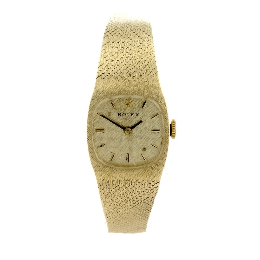 ROLEX - a lady's bracelet watch. Yellow metal case, (1 of 4)