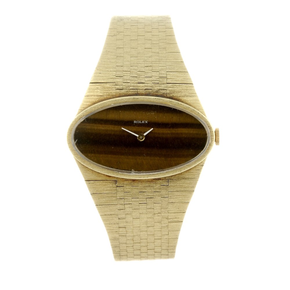 ROLEX - a lady's bracelet watch. 14ct yellow gold case, (1 of 4)