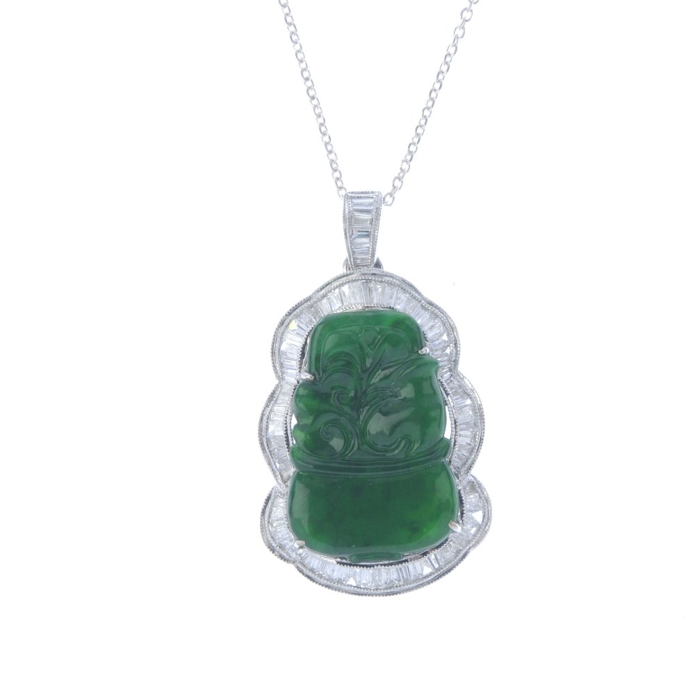 A floral carved jade and diamond pendant. The carved (1 of 3)