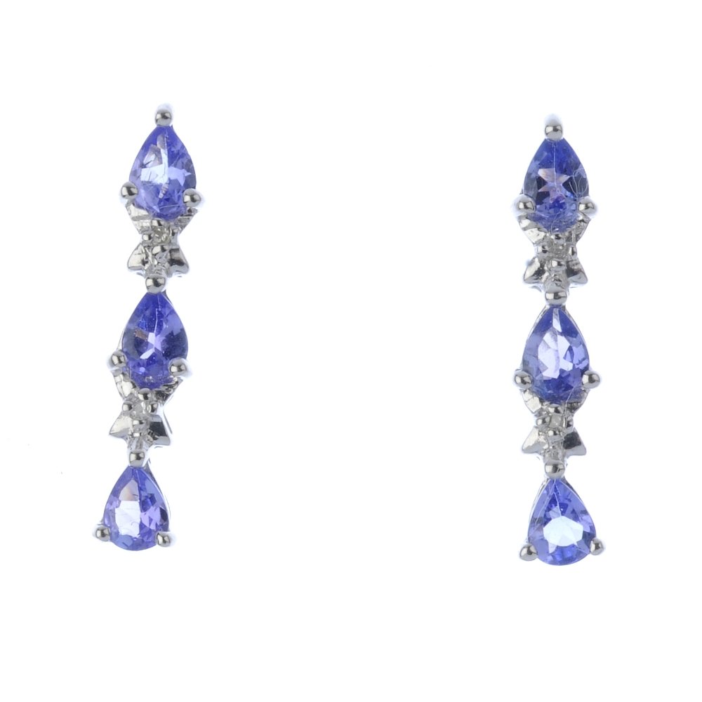 A pair of tanzanite earrings. Each designed as a (1 of 2)