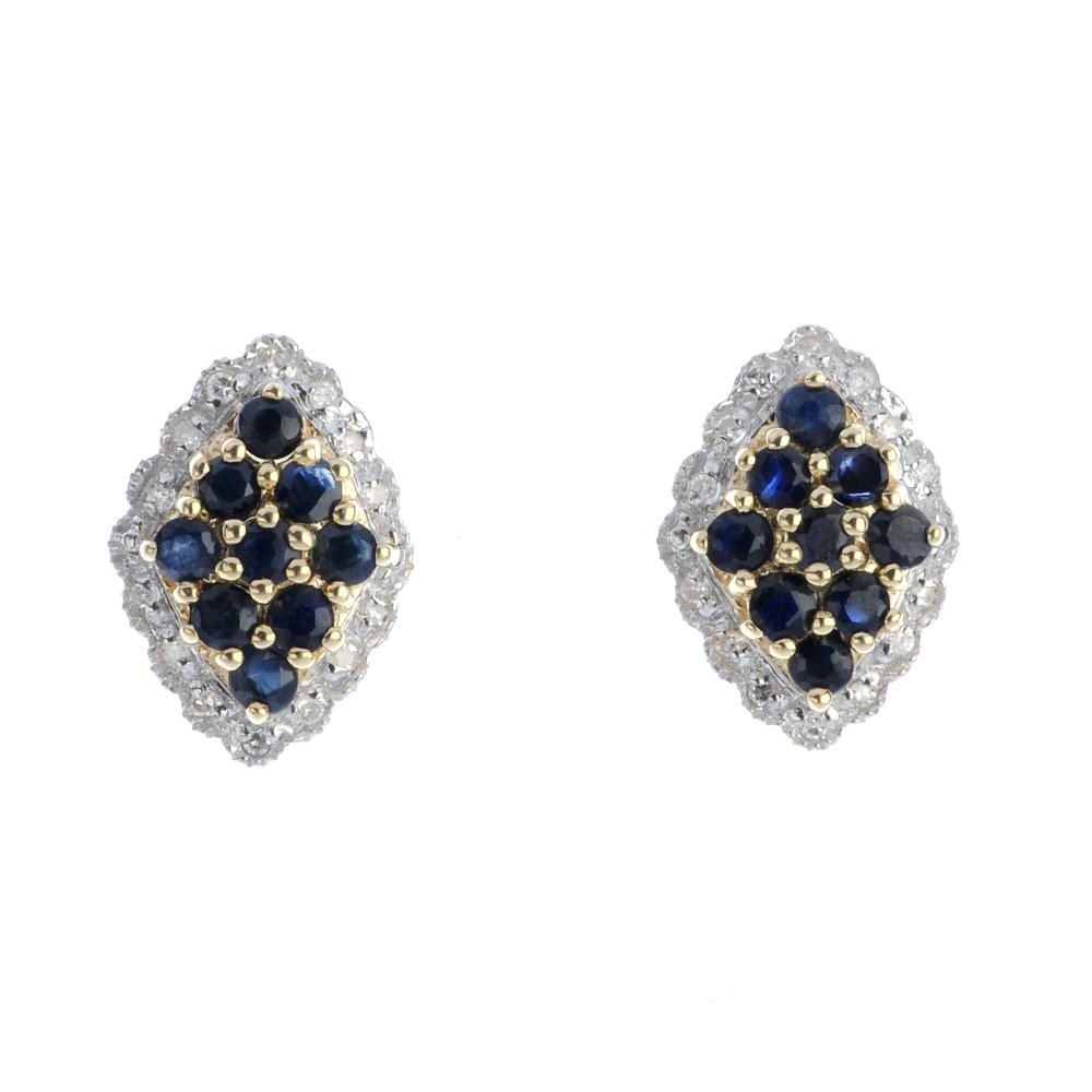 A pair of 9ct gold sapphire earrings. Each designed as (1 of 2)