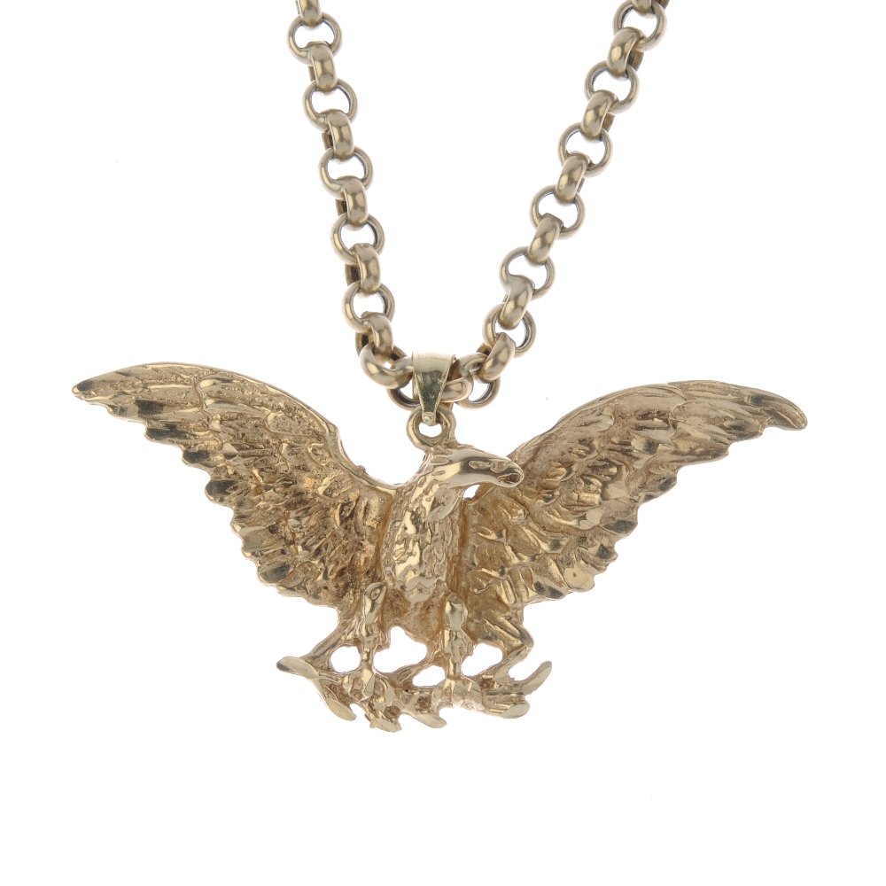 An eagle pendant, with 9ct gold chain. The textured (1 of 3)