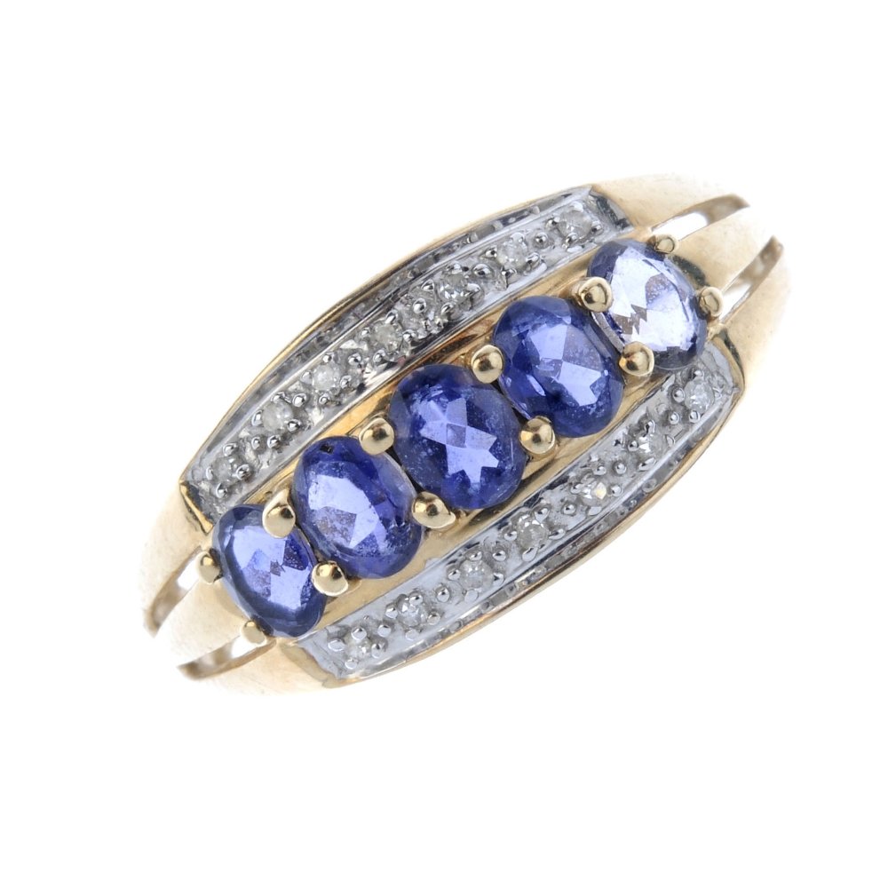 A 9ct sapphire and diamond dress ring. The oval-shape (1 of 3)