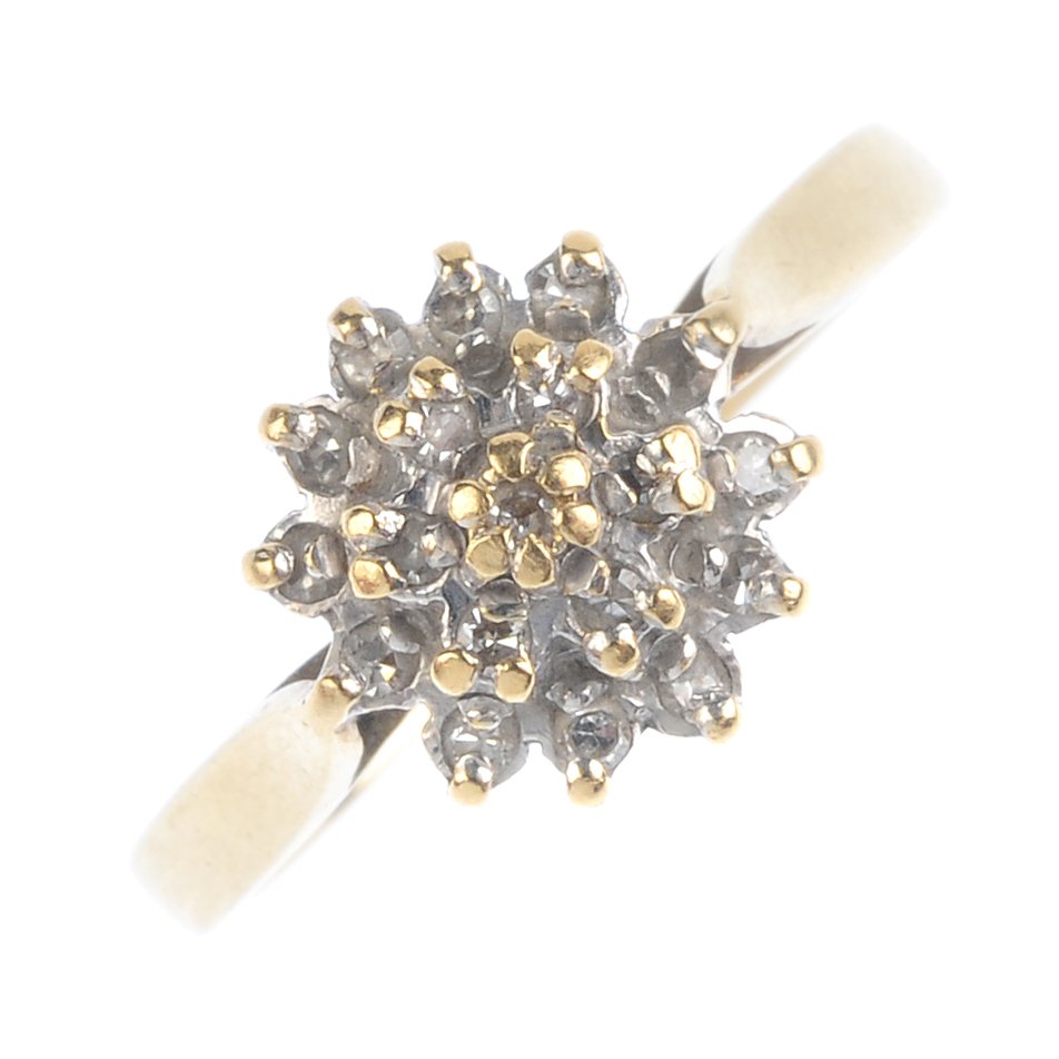 An 18ct gold diamond cluster ring. The single-cut (1 of 3)