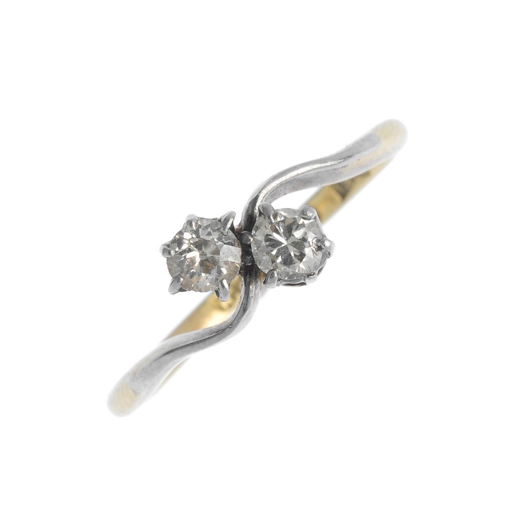 A mid 20th century 18ct gold diamond dress ring. The (1 of 3)