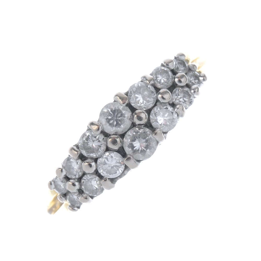 An 18ct gold diamond two-row ring. The graduated (1 of 4)