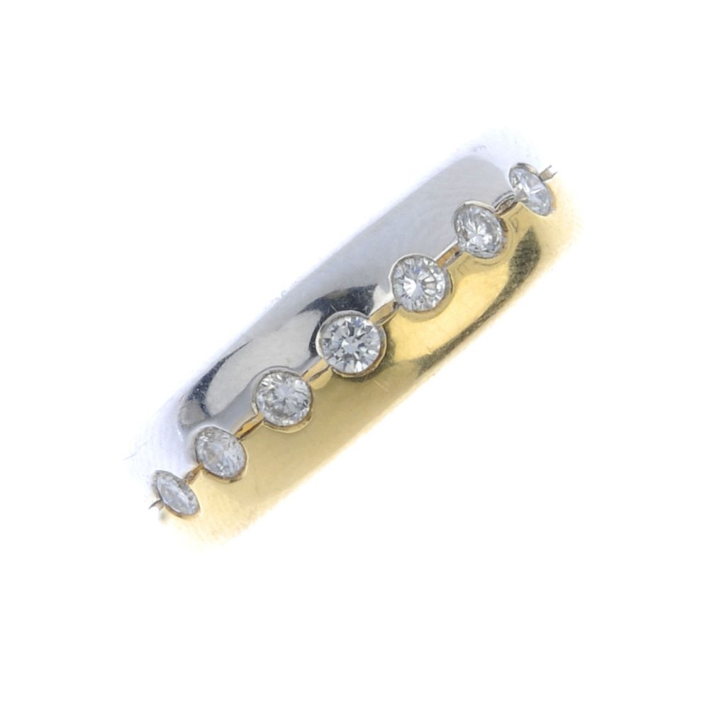 An 18ct gold diamond band ring. Of bi-colour design, (1 of 3)