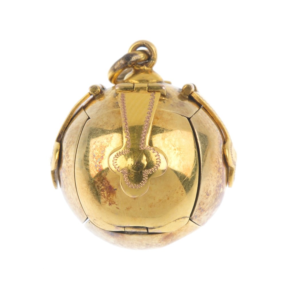 A Masonic ball pendant. Designed as a sphere, unfurling (1 of 2)