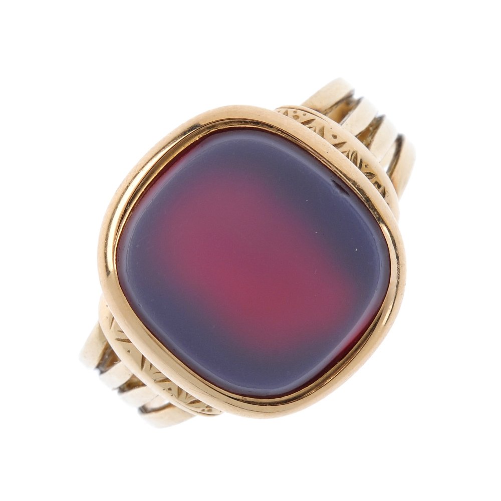 A late Victorian 15ct gold hardstone signet ring. The (1 of 3)
