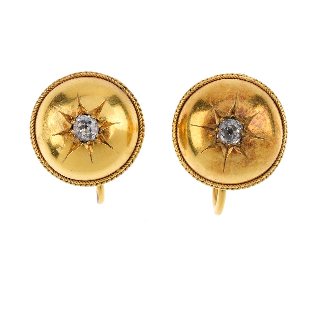 A pair of late Victorian gold diamond earrings. Each (1 of 2)