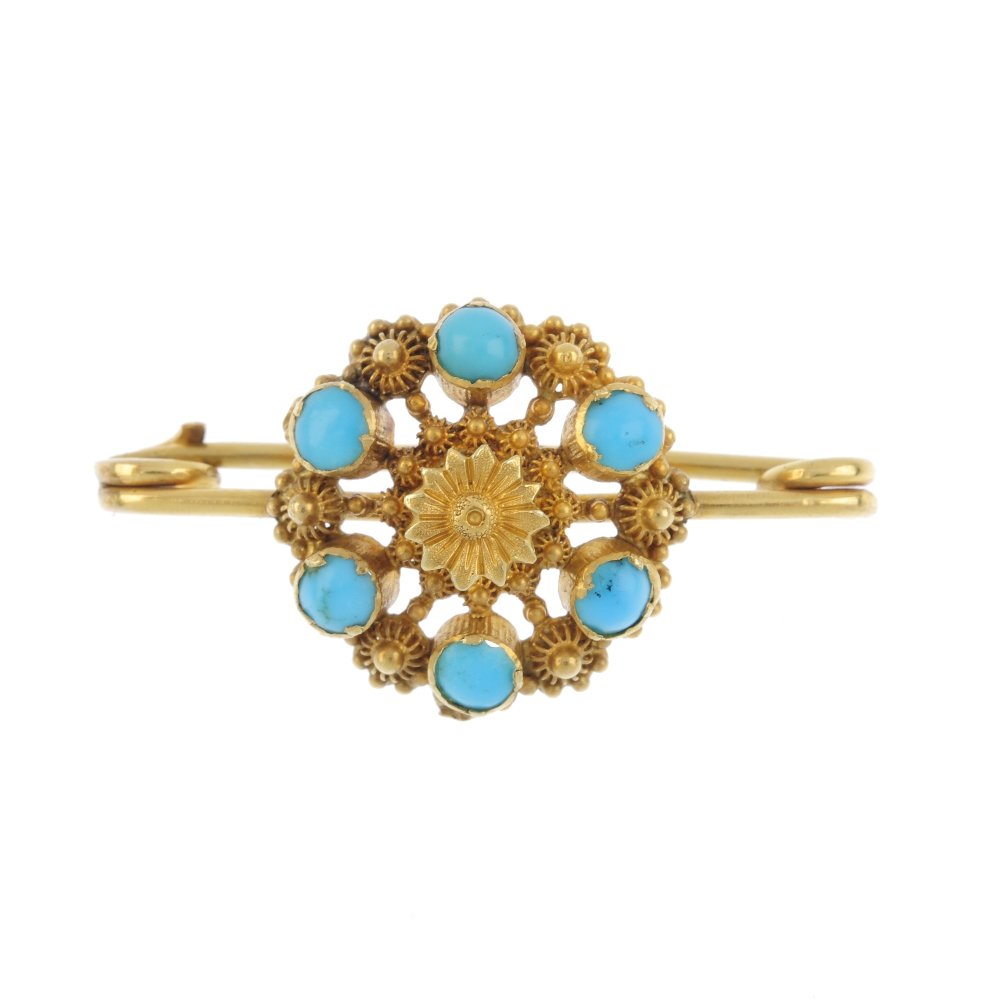 A late Victorian turquoise brooch. The textured flower, (1 of 2)