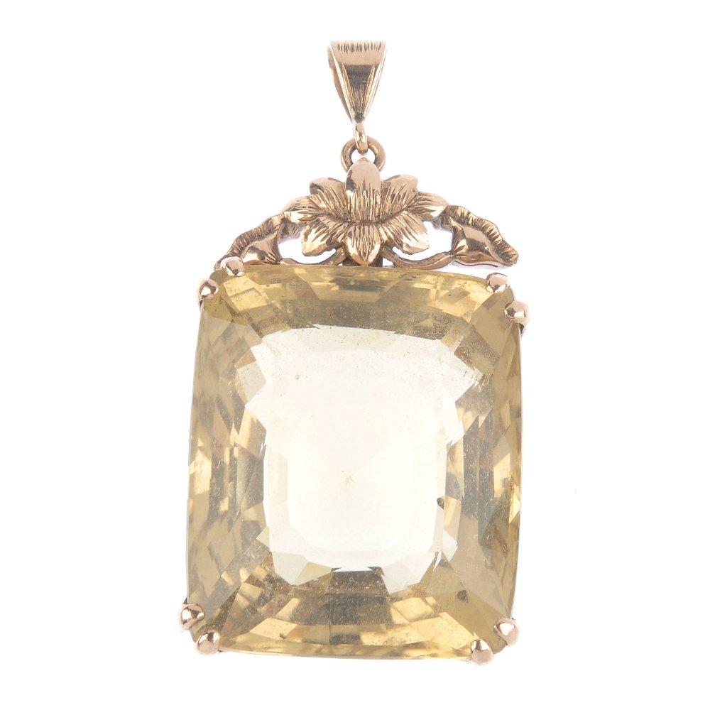 A citrine pendant. The rectangular-shape citrine, (1 of 2)