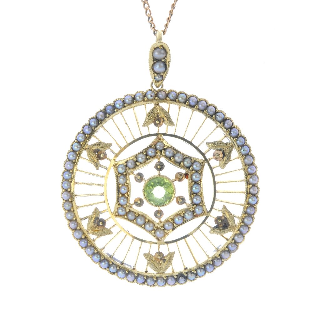An early 20th century 15ct gold peridot and split pearl (1 of 3)