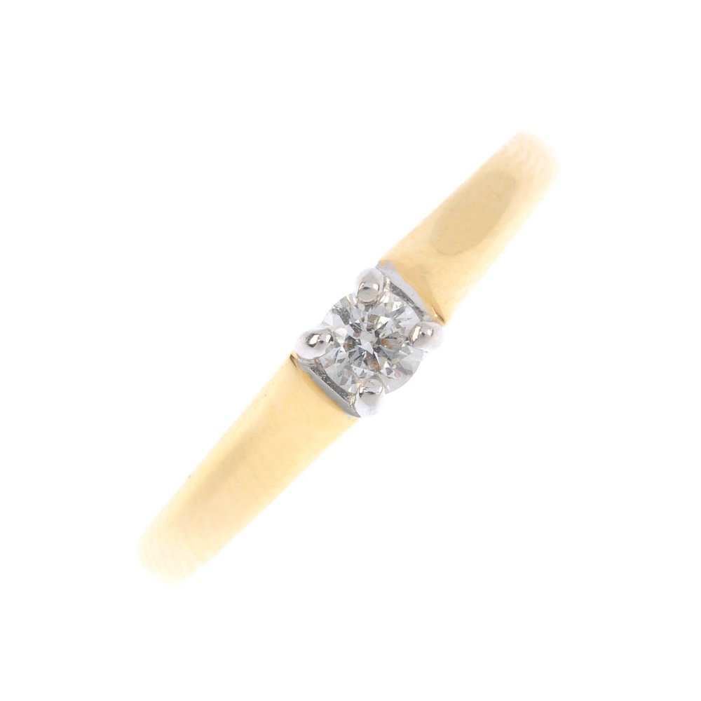 An 18ct gold diamond single-stone ring. The (1 of 3)