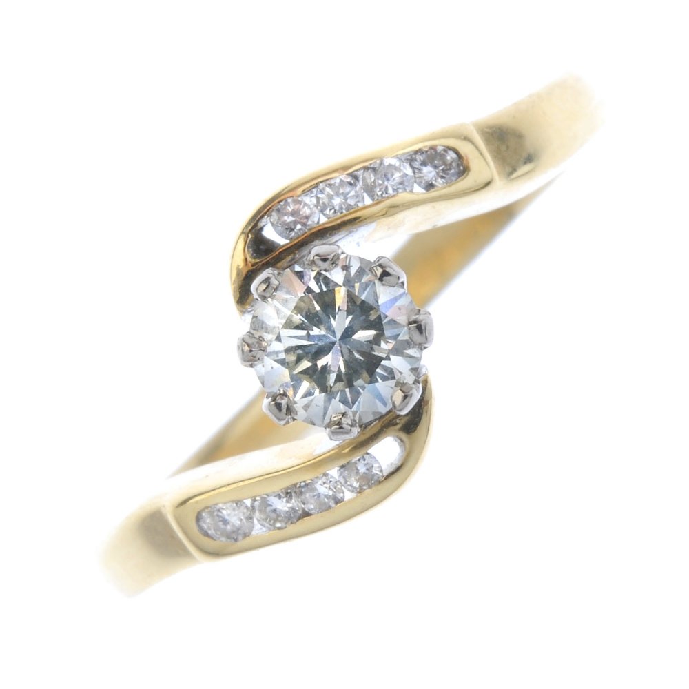An 18ct gold diamond crossover ring. The brilliant-cut (1 of 3)