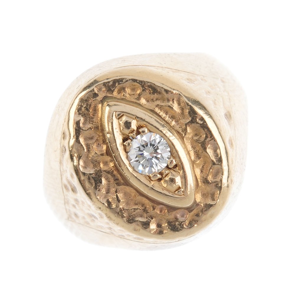 A diamond signet ring. The brilliant-cut diamond, with (1 of 3)