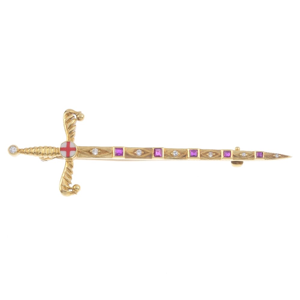 A ruby and diamond sword brooch. The blade set with (1 of 2)